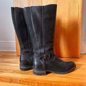 Black leather knee high boots